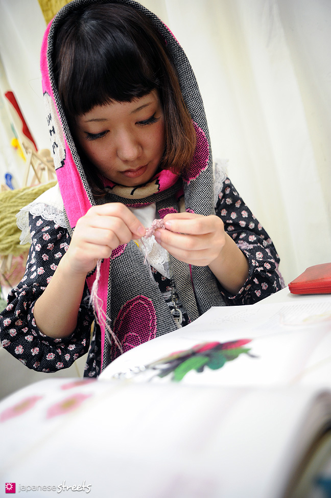 111103-6004: A student at work at the Culture Festival of Bunka Fashion College in Tokyo
